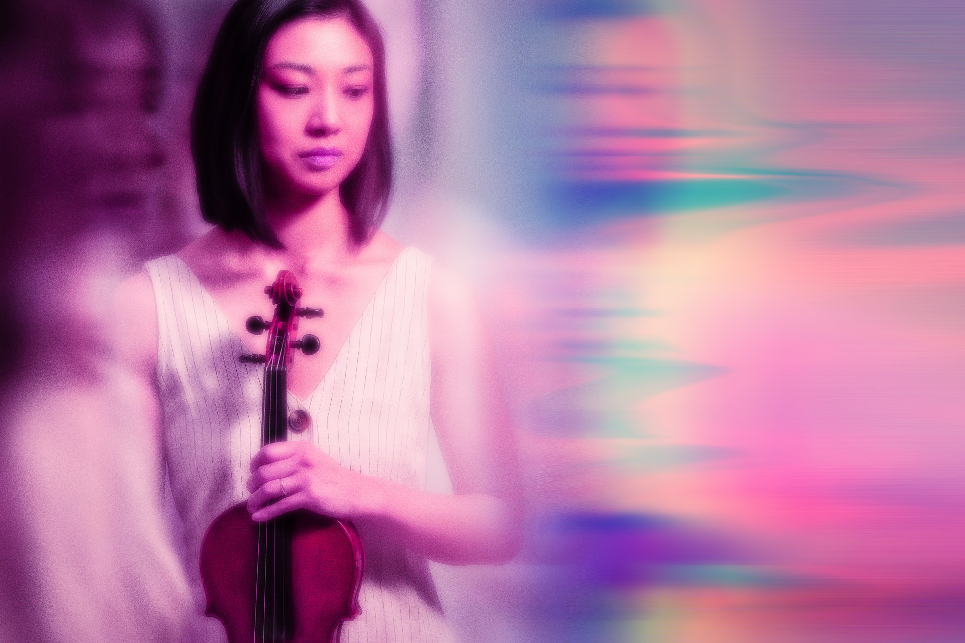 Musician holding violin.