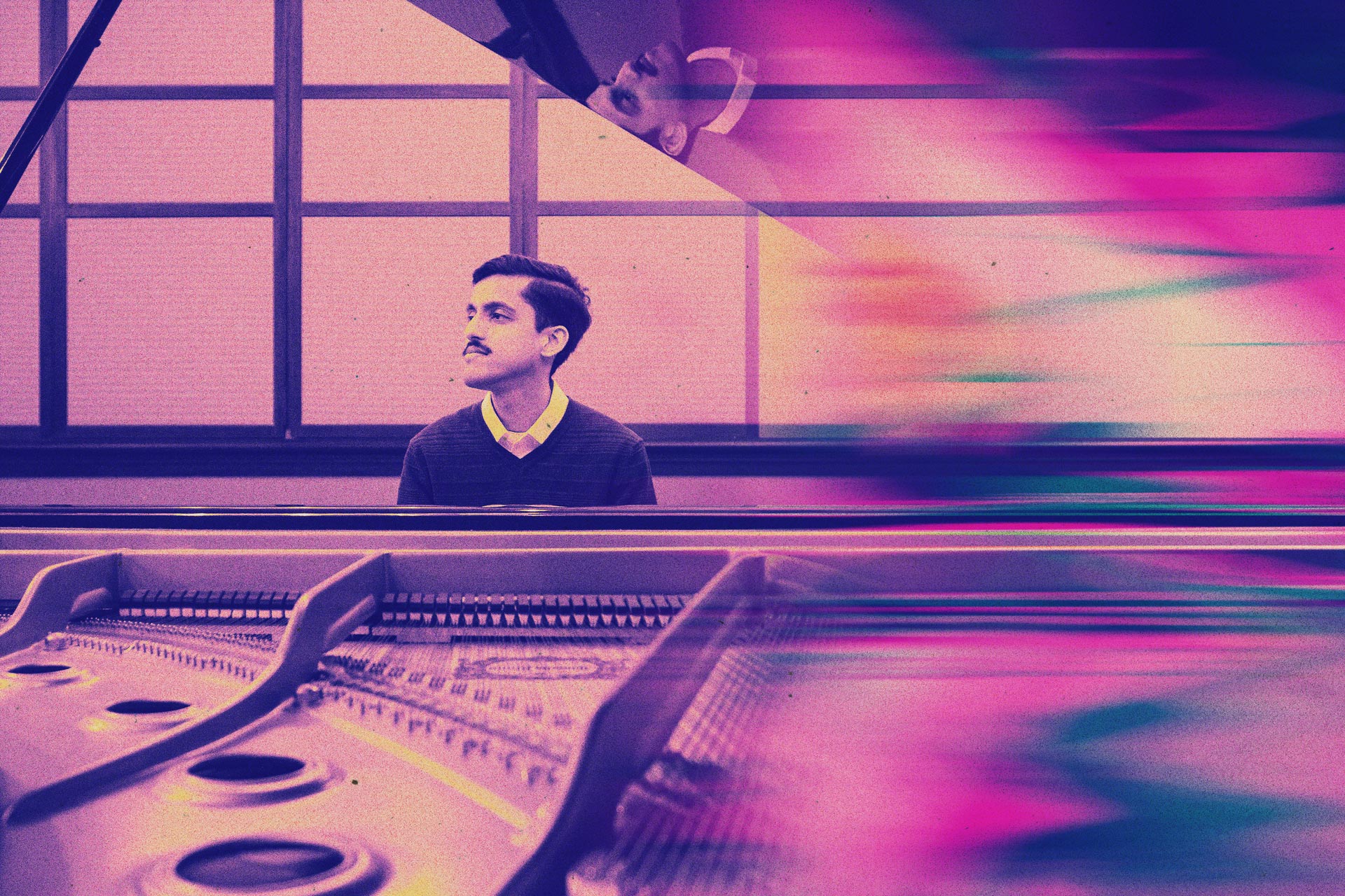 Student playing piano.
