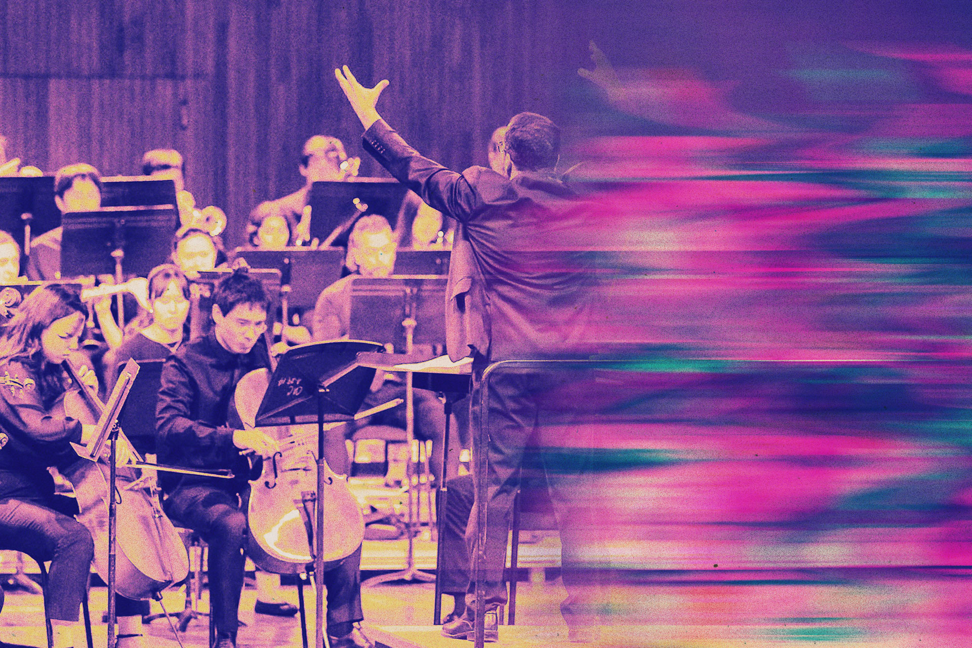 Symphony orchestra playing in a concert. in Kresge Auditorium at MIT.